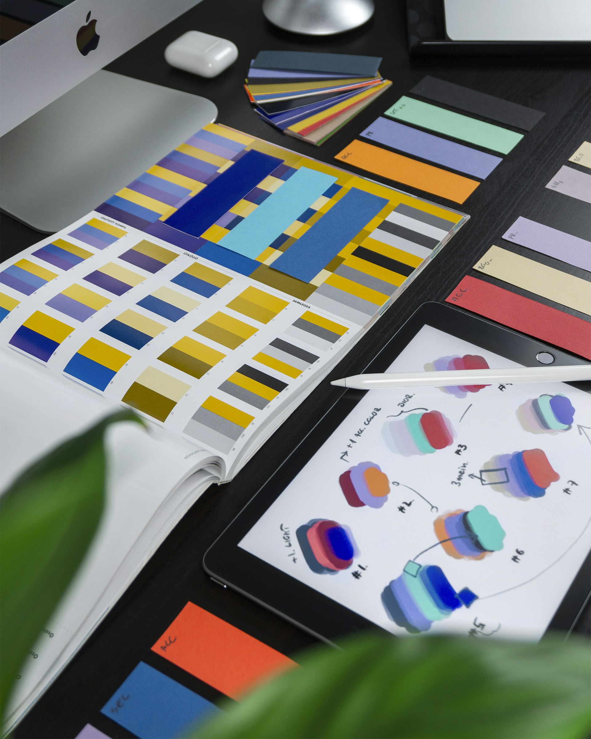 Brand strategy materials on a design desk at BrandSpark